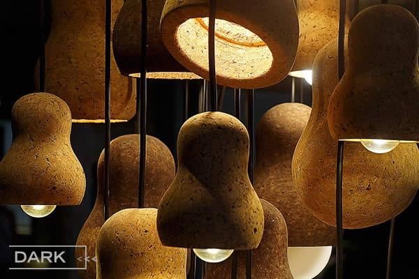 CAPTAIN CORK is a ceiling lamp created from large pieces of cork, showcasing the natural beauty of cork. 